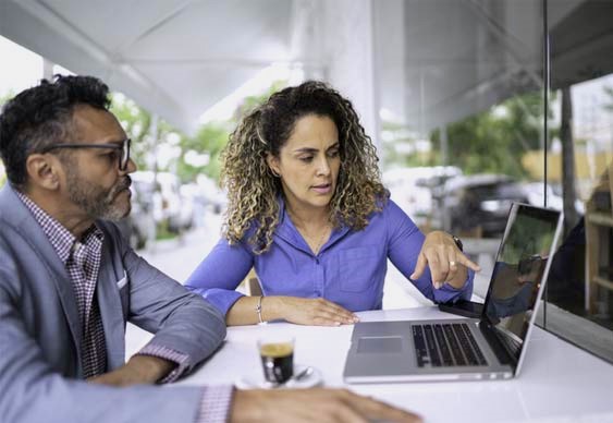 Two colleagues discussing a reference check